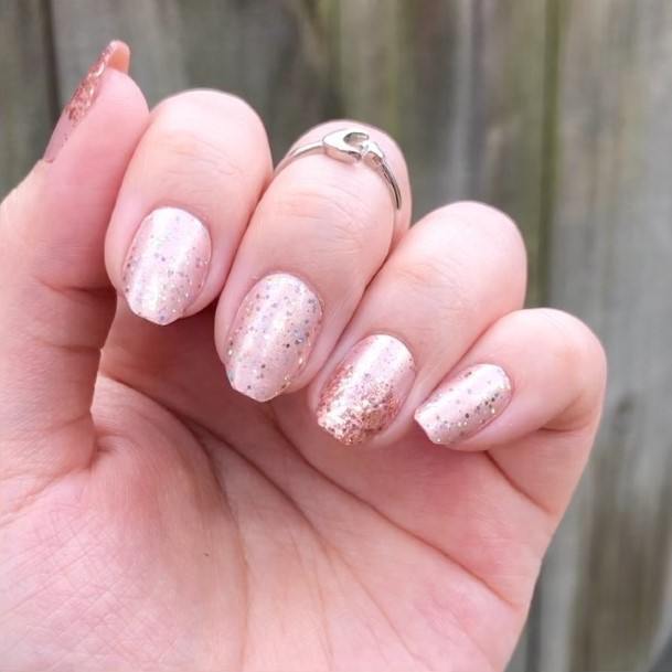 Girl With Graceful Pale Pink Nails