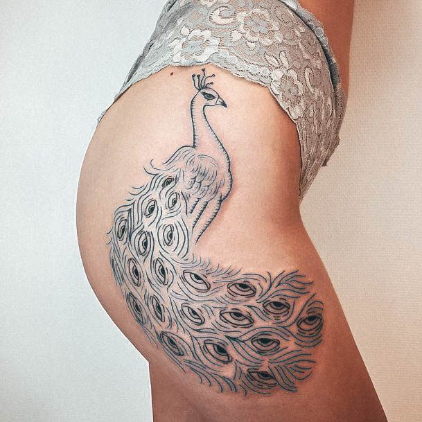 Girl With Graceful Peacock Tattoos