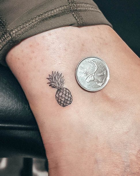 Girl With Graceful Pineapple Tattoos