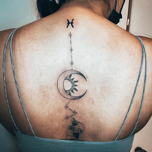 Girl With Graceful Pisces Tattoos Spine