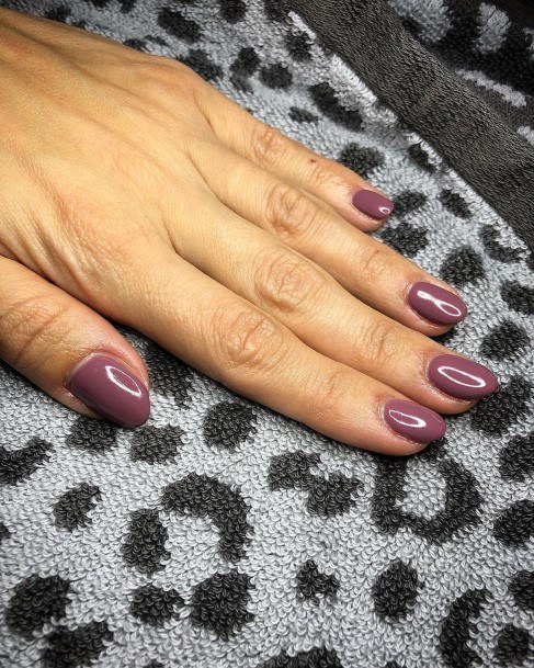 Girl With Graceful Plum Nails