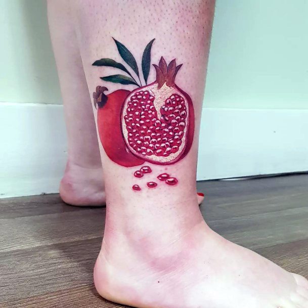 Girl With Graceful Pomegranate Tattoos