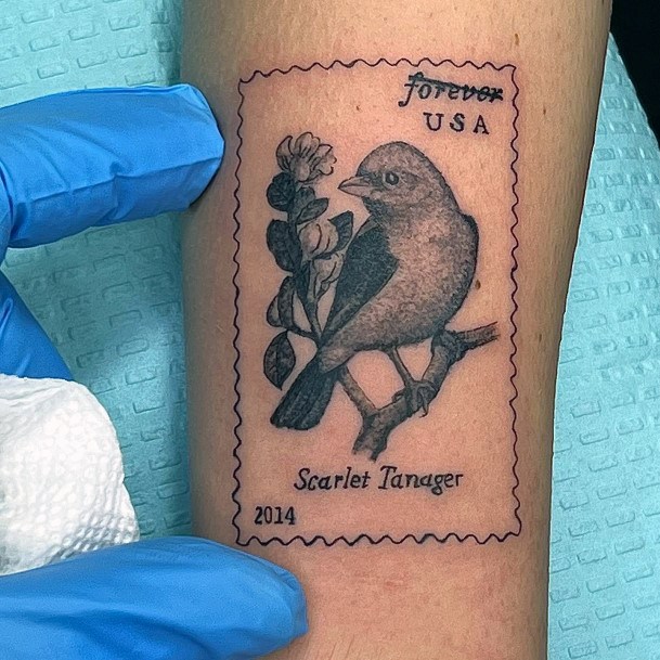 Girl With Graceful Postage Stamp Tattoos