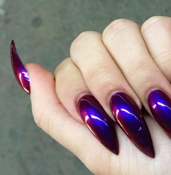 Girl With Graceful Red And Purple Nails