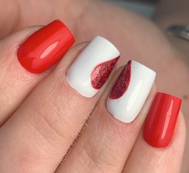 Girl With Graceful Red And White Nails