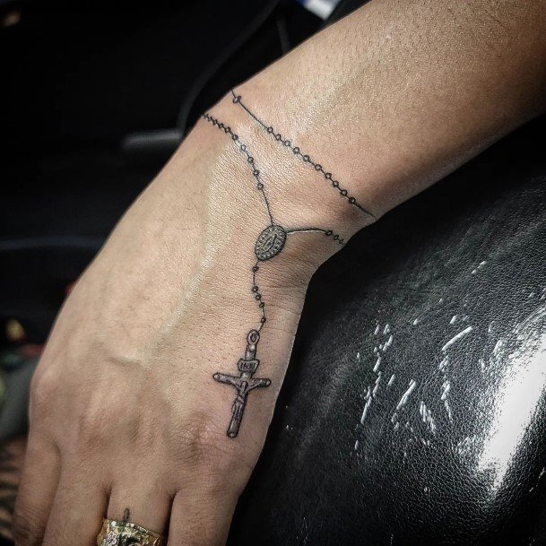 Girl With Graceful Rosary Tattoos