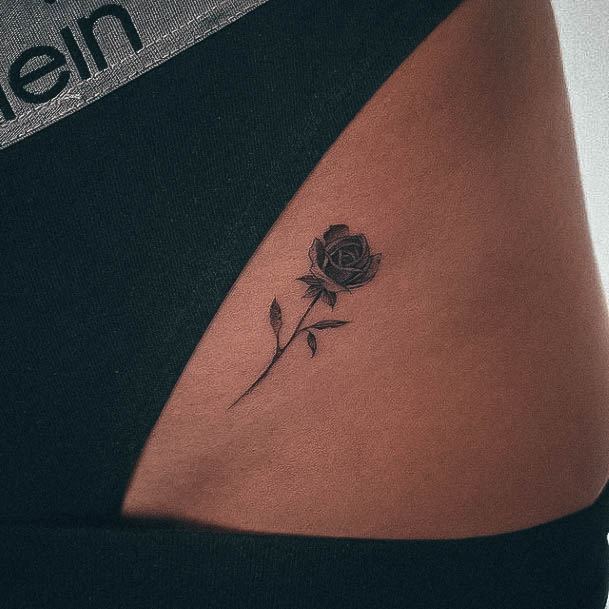 Girl With Graceful Rose Thigh Tattoos