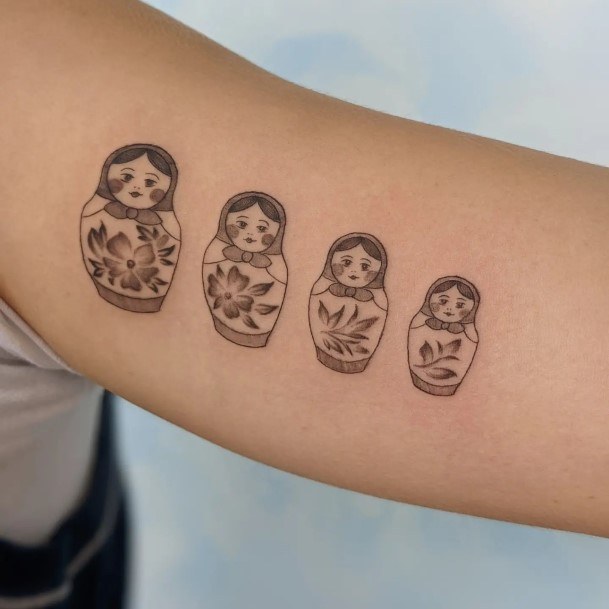 Girl With Graceful Russian Nesting Doll Matryoshka Tattoos