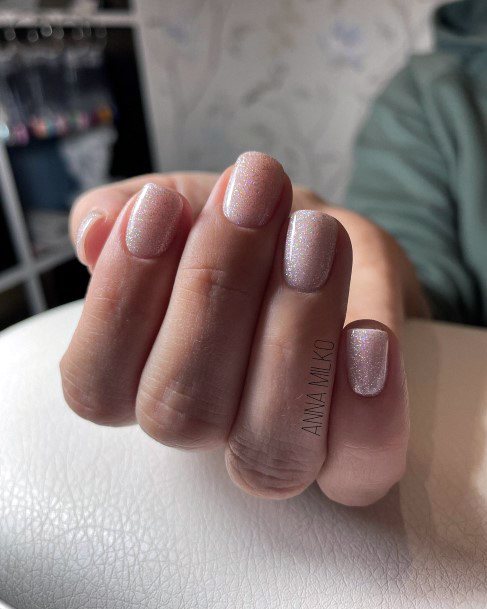 Girl With Graceful Shimmer Nails