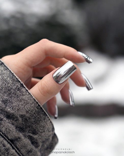 Girl With Graceful Silver Dress Nails