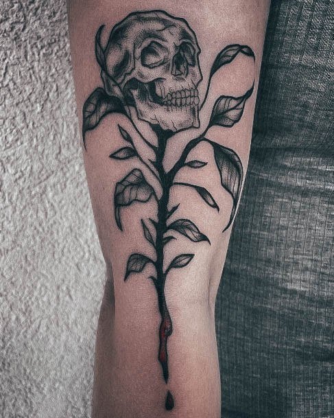 Girl With Graceful Skull And Rose Tattoos