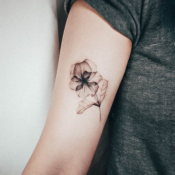 Girl With Graceful Small Flower Tattoos