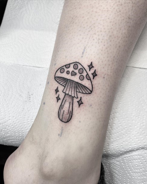 Girl With Graceful Small Mushroom Tattoos