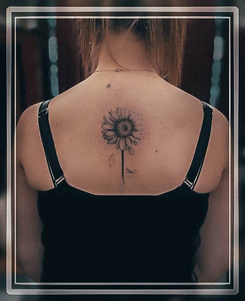 Girl With Graceful Small Sunflower Tattoos