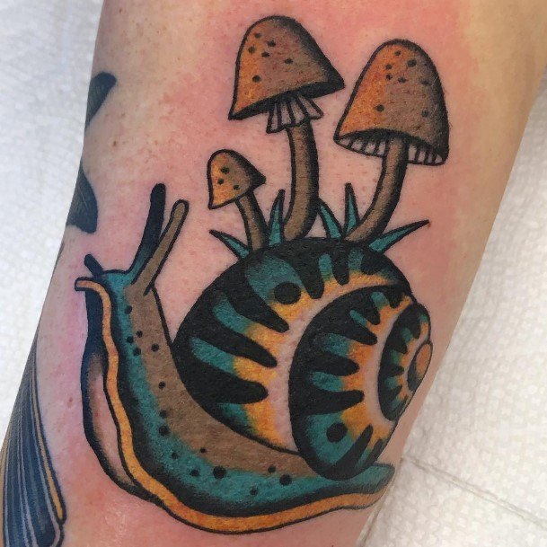 Girl With Graceful Snail Tattoos