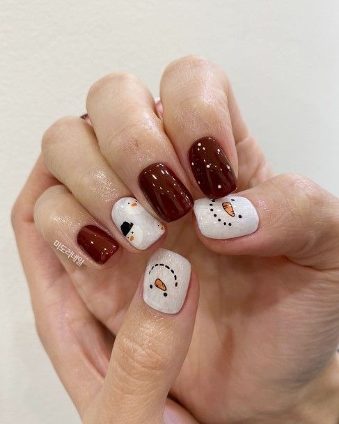 Girl With Graceful Snowman Nails