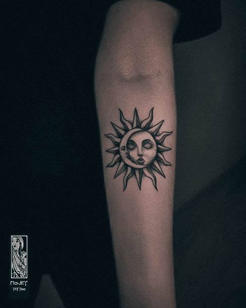 Girl With Graceful Sun And Moon Tattoos