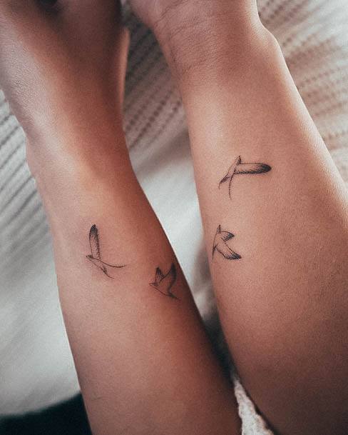 Girl With Graceful Swallow Tattoos