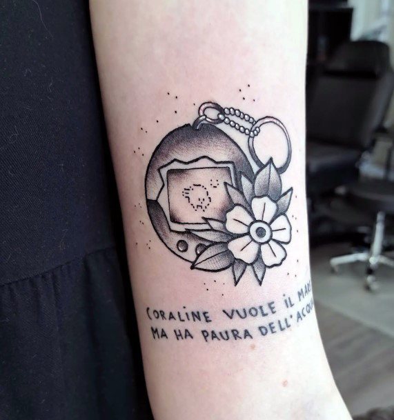 Girl With Graceful Tamagotchi Tattoos