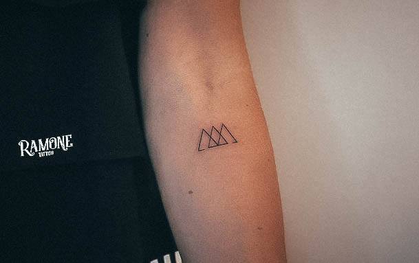 Girl With Graceful Triangle Tattoos