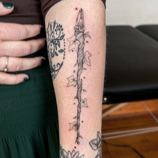 Girl With Graceful Wand Tattoos