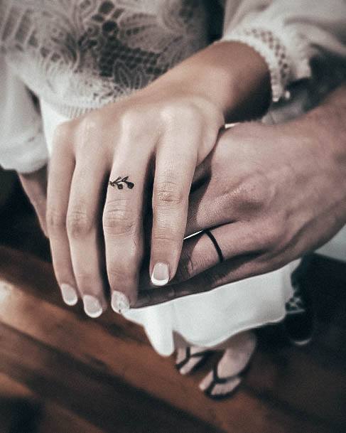 Girl With Graceful Wedding Ring Tattoos