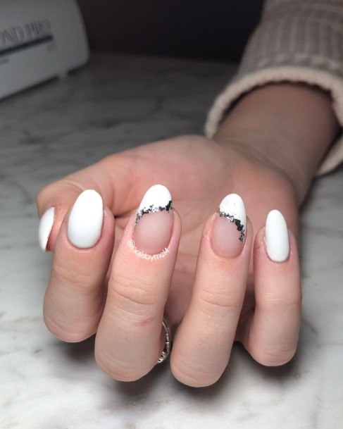 Girl With Graceful White And Silver Nails