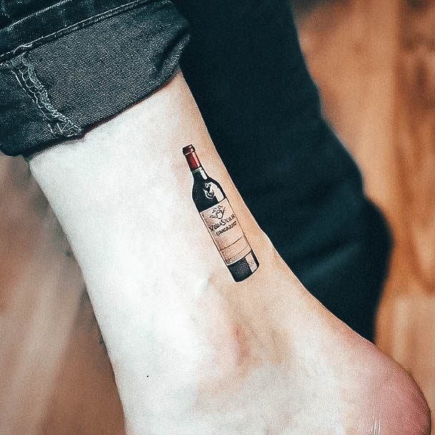 Girl With Graceful Wine Tattoos