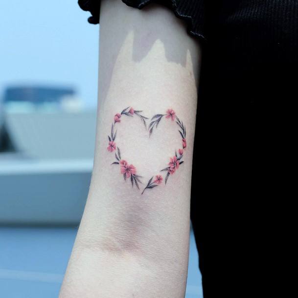 Girl With Graceful Wreath Tattoos