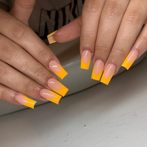 Girl With Graceful Yellow French Tip Nails