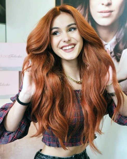 Girl With Long Auburn Hair And Center Part Red Hairstyle Ideas For Women