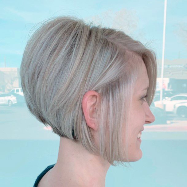 Girl With Short Wedge Dark Under And Light Top Hair Color