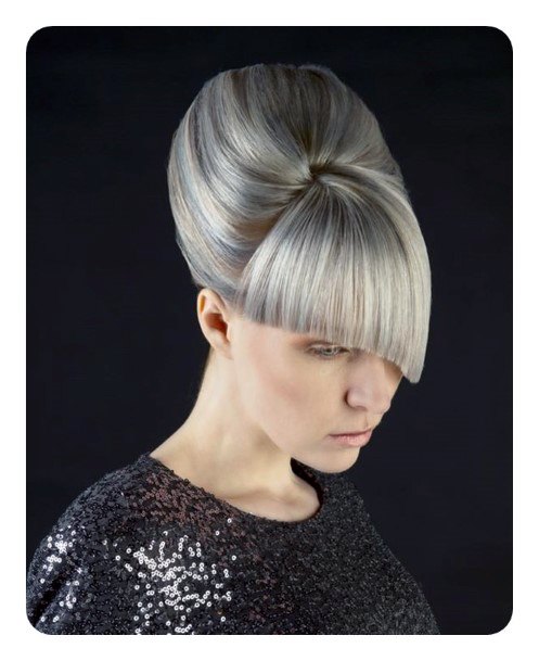 Girl With Silver Hair With Sleek Beehive Hairstyle And Bangs