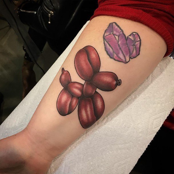 Girl With Stupendous Ballon Animal Tattoos