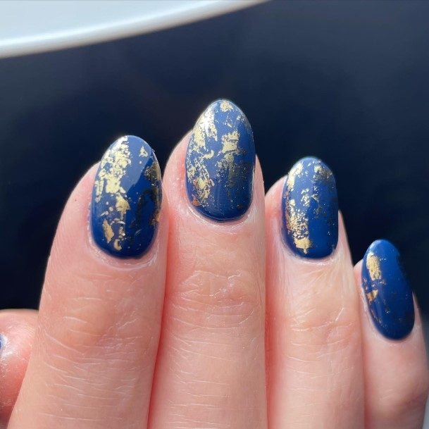 Girl With Stupendous Blue And Gold Nails