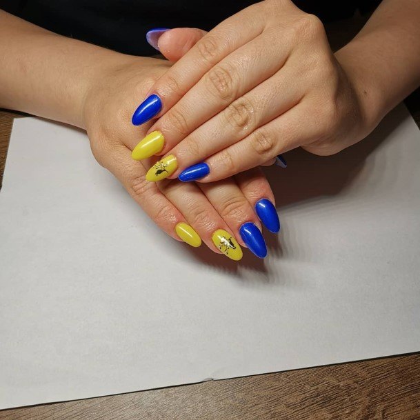 Girl With Stupendous Blue And Yellow Nails