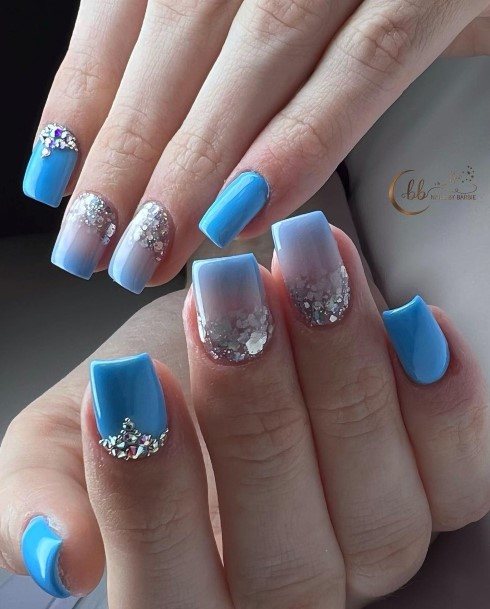 Girl With Stupendous Blue Glitter Nails