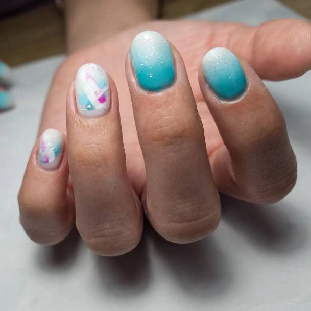 Girl With Stupendous Blue Ombre Nails