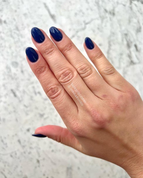 Girl With Stupendous Blue Short Nails