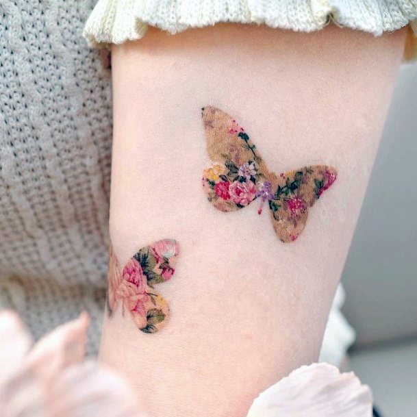 Girl With Stupendous Butterfly Flower Tattoos