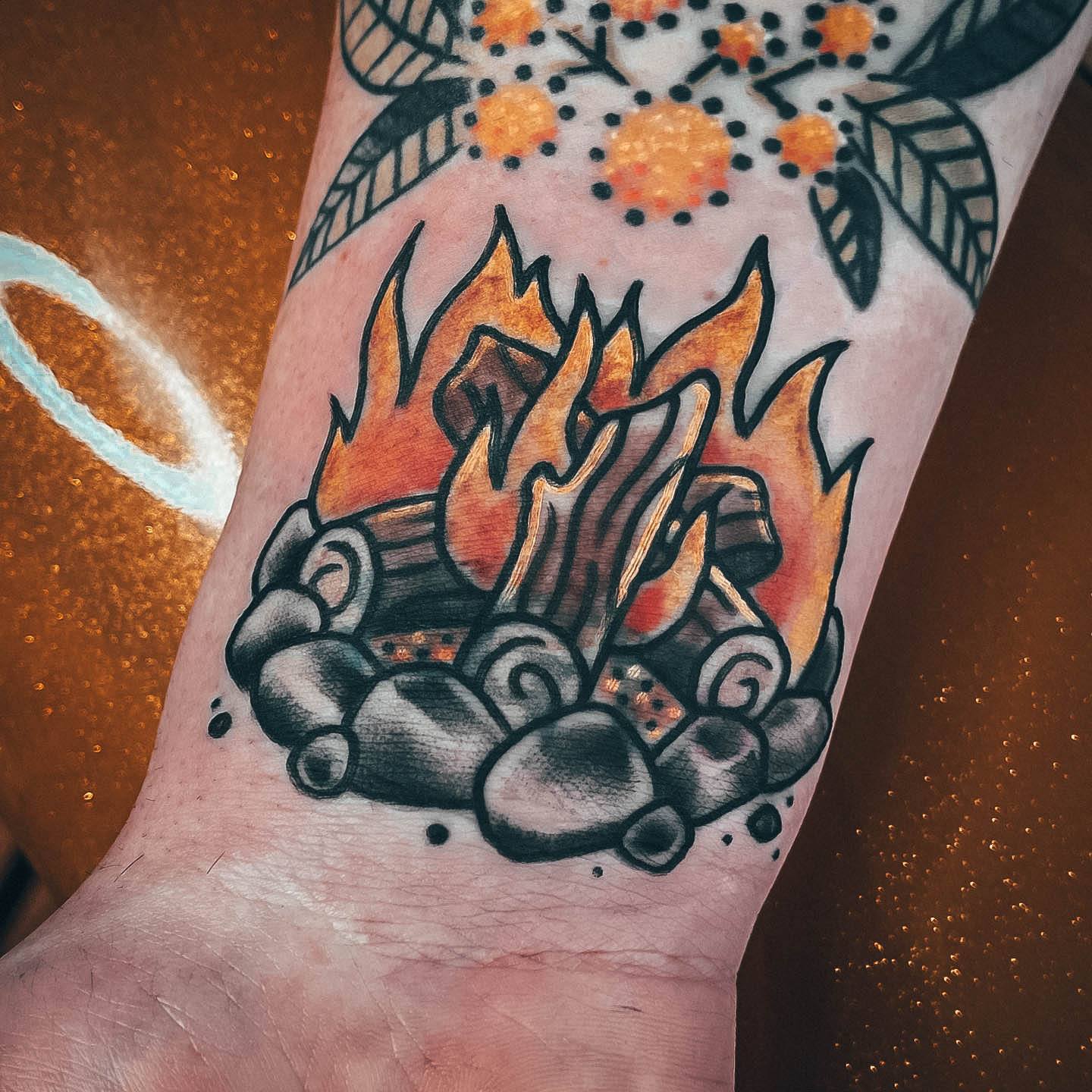 Girl With Stupendous Campfire Tattoos