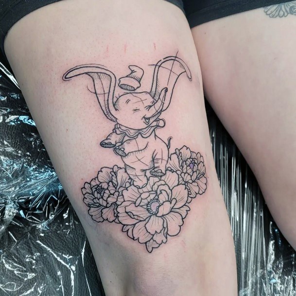 Girl With Stupendous Dumbo Tattoos