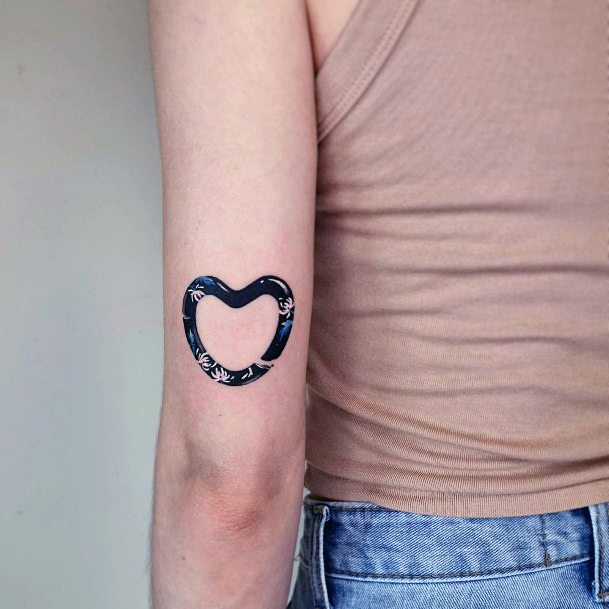 Girl With Stupendous Flower Heart Tattoos