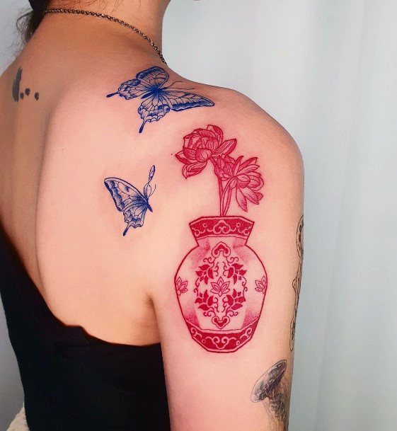 Girl With Stupendous Flower Vase Tattoos