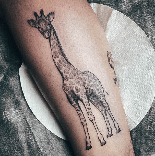 Girl With Stupendous Giraffe Tattoos