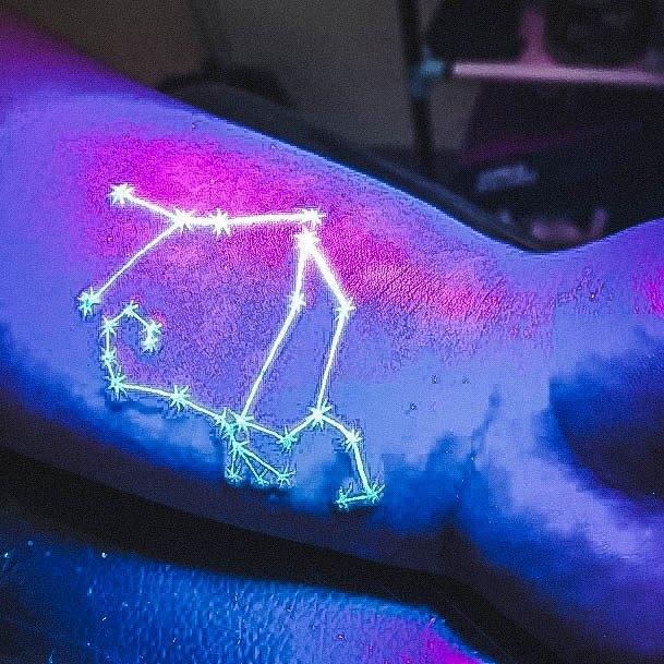 Girl With Stupendous Glow In The Dark Tattoos