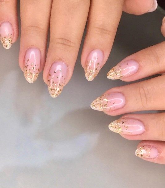 Girl With Stupendous Gold Ombre Nails