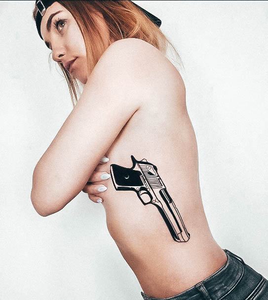 Girl With Stupendous Gun Tattoos