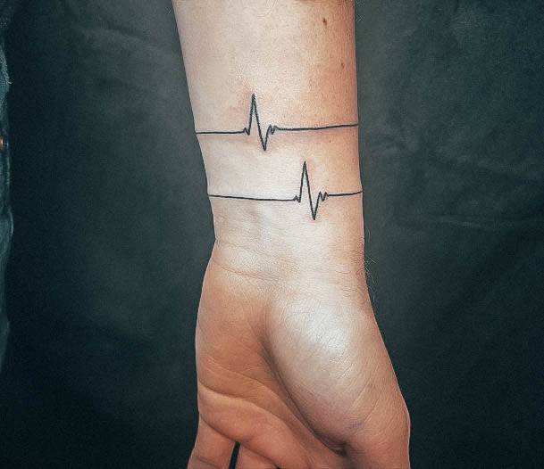 Girl With Stupendous Heartbeat Tattoos