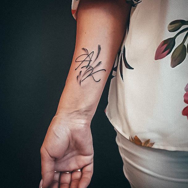 Girl With Stupendous Initials Tattoos